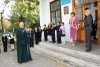 священник