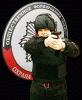 охрана_общественная организация "захист"_мужчина в комуфляже с пистолетом
